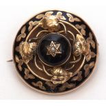 Antique black enamel inlaid circular mourning brooch, the domed centre with small seed pearl