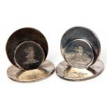 Pair of Edward VII disc formed menu holders, each bearing a dragon's head crest, Chester 1905 by