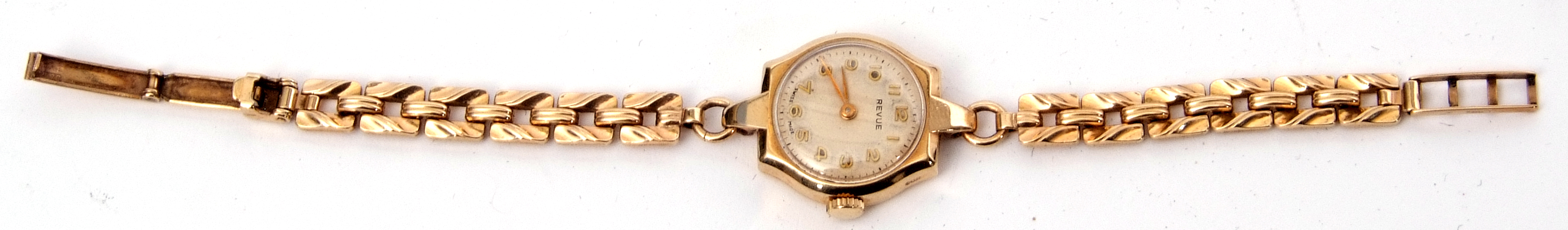 Ladies 9ct gold cased Revue wrist watch with gold hands to a cream coloured dial with raised gold