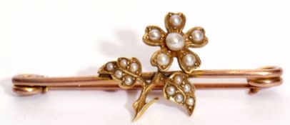 Vintage yellow metal and seed pearl brooch, flower and leaf design, set throughout with graduated