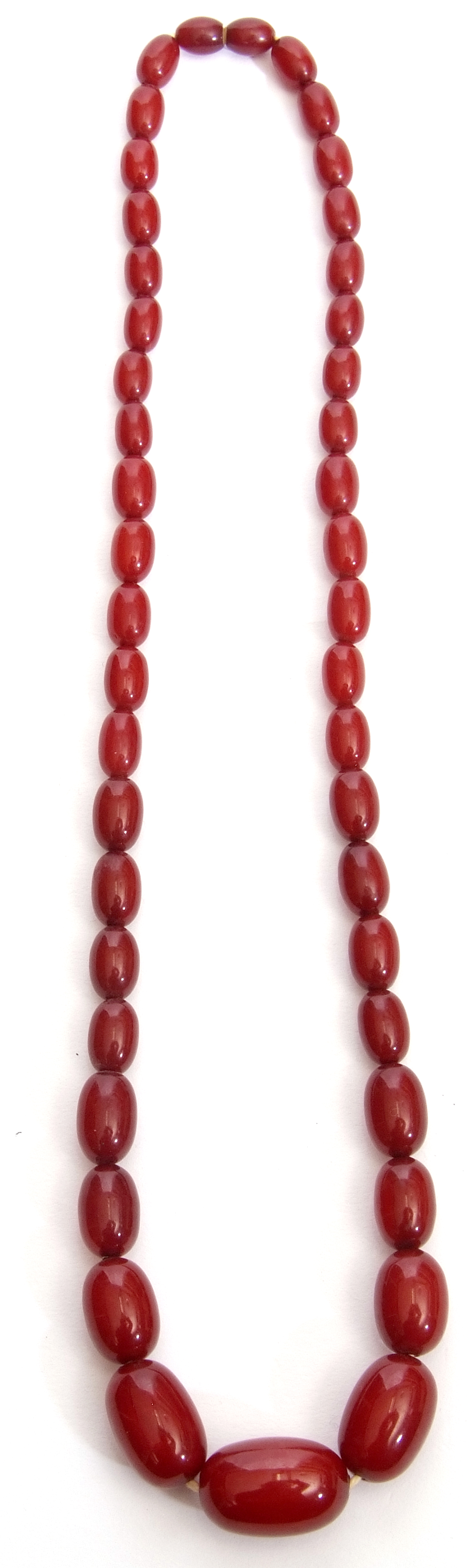Vintage cherry amber bead necklace, a single row of oblong graduated beads, 1cm to 2.5cm, 30cm