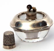 Early 20th century moulded glass and white metal applied small table lighter, stamped "Amston,