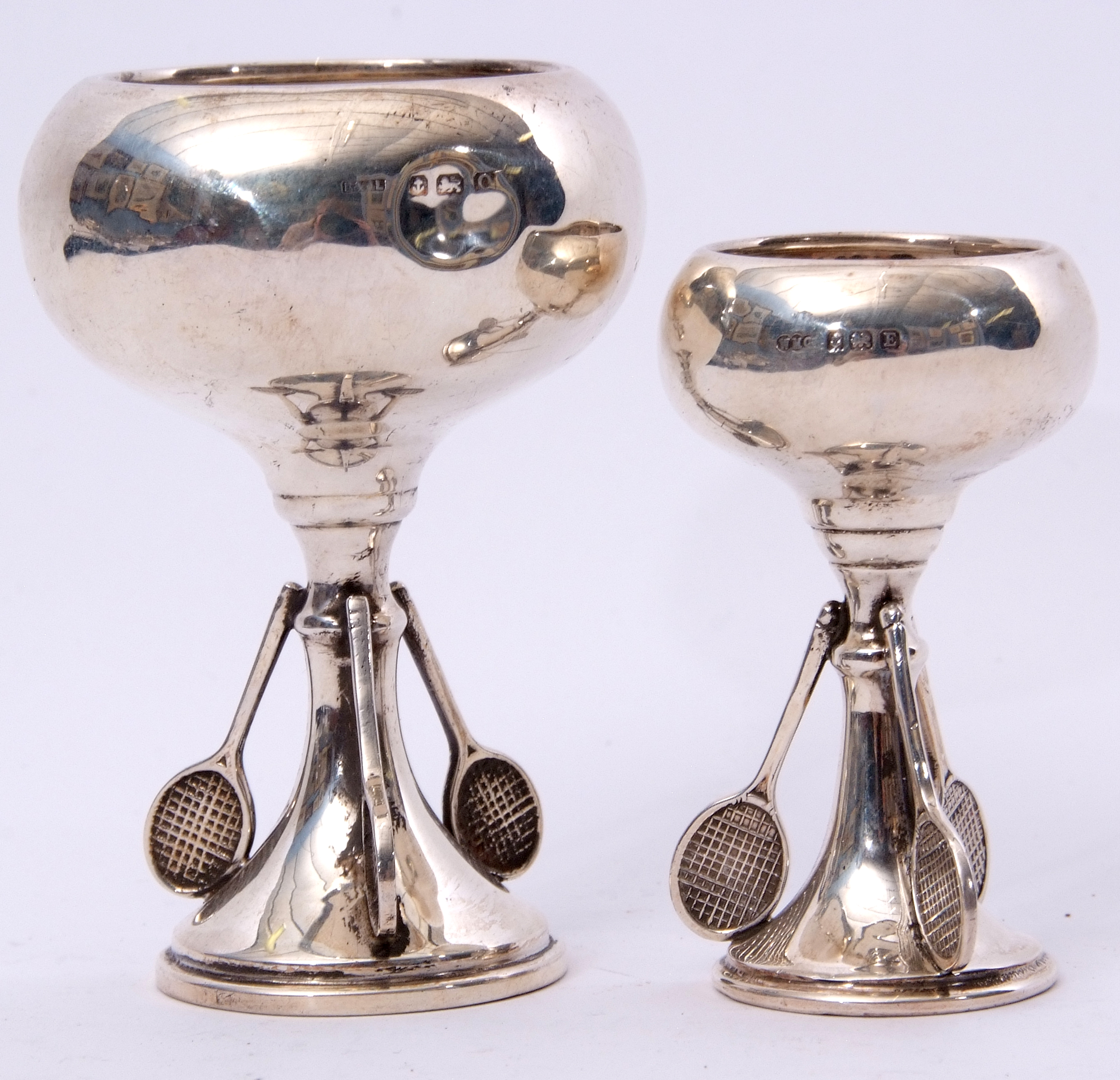 George VI small tennis presentation cup featuring three tennis rackets adjoined to the stem and
