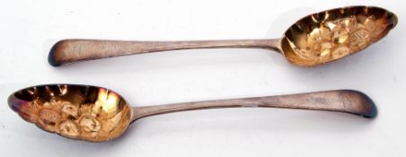 Pair of George III berry table spoons in Old English pattern, later engraved and embossed with fruit