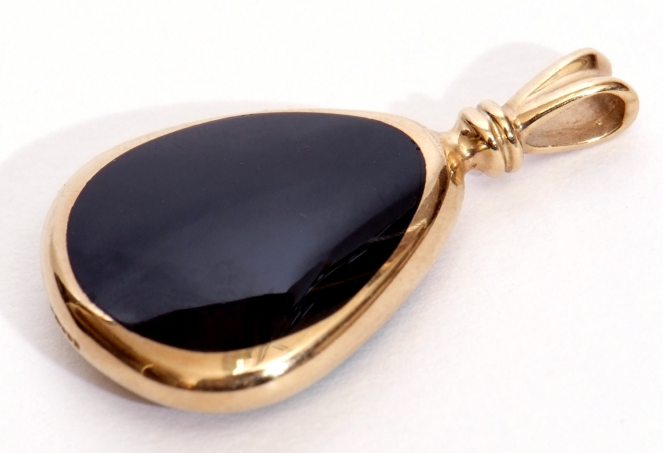 An onyx and marcasite double sided pendant, pear shaped in a 9ct gold frame, Sheffield 1995 - Image 2 of 2