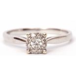 Modern 9ct white gold and diamond cluster ring, the principal brilliant cut diamond is 0.15ct approx