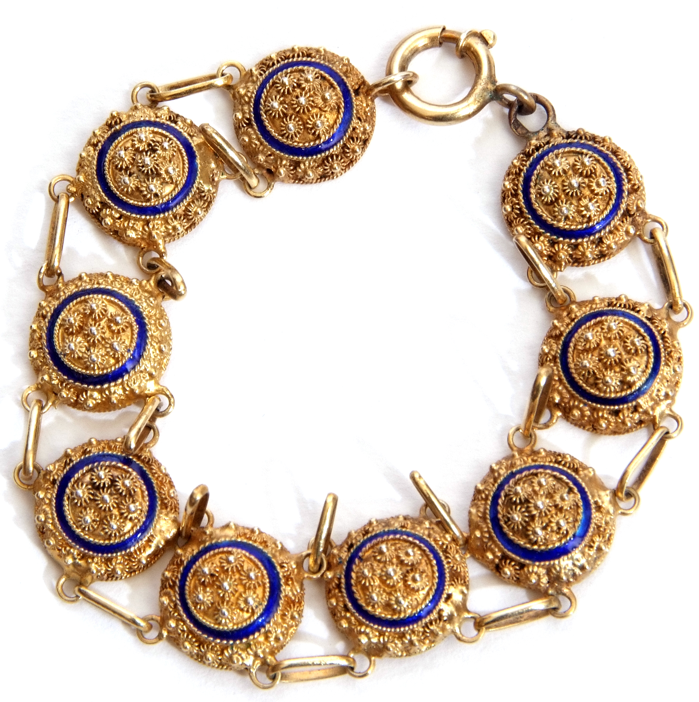 Vintage Portuguese silver gilt and enamel bracelet, a design featuring nine joined circular filigree