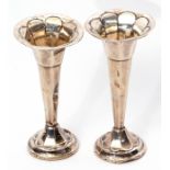 Pair of George V small trumpet flower vases of panelled circular form with tapering stems and loaded