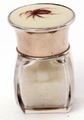 George V faceted glass smelling salt bottle of square section, the screw on silver lid featuring