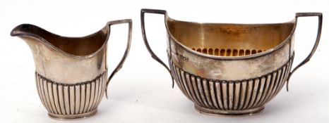 Edward VII two-handled sugar bowl of boat shape, half fluted decoration, angular handles, gilt