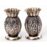 Pair of late Victorian miniature baluster vases with foliate embossed baluster body, wavy top and