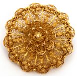 Antique mid-grade yellow metal Etruscan style brooch of circular form, filigree and bead design, 3cm