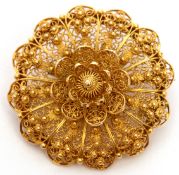 Antique mid-grade yellow metal Etruscan style brooch of circular form, filigree and bead design, 3cm