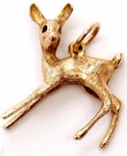 9ct gold pendant/charm of a naturalistic design of a deer with chased detail, 4.6gms