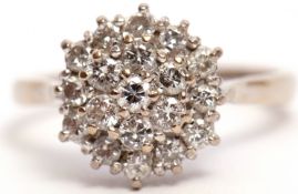 Diamond cluster ring, the three tiers of brilliant cut diamonds all in a basket mount, stamped 18ct,