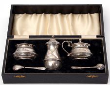 Cased silver condiment set to include open salt and liner, matching cauldron shaped lidded