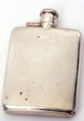 George VI small spirit flask of curved rectangular form with bayonet hinged lid, engine turned
