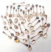 Collection of 30 assorted hallmarked silver souvenir spoons, some with enamel tops, weighing