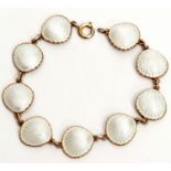 Vintage 925 white guilloche enamel bracelet, circa 1950, comprising nine shells joined by single