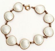 Vintage 925 white guilloche enamel bracelet, circa 1950, comprising nine shells joined by single