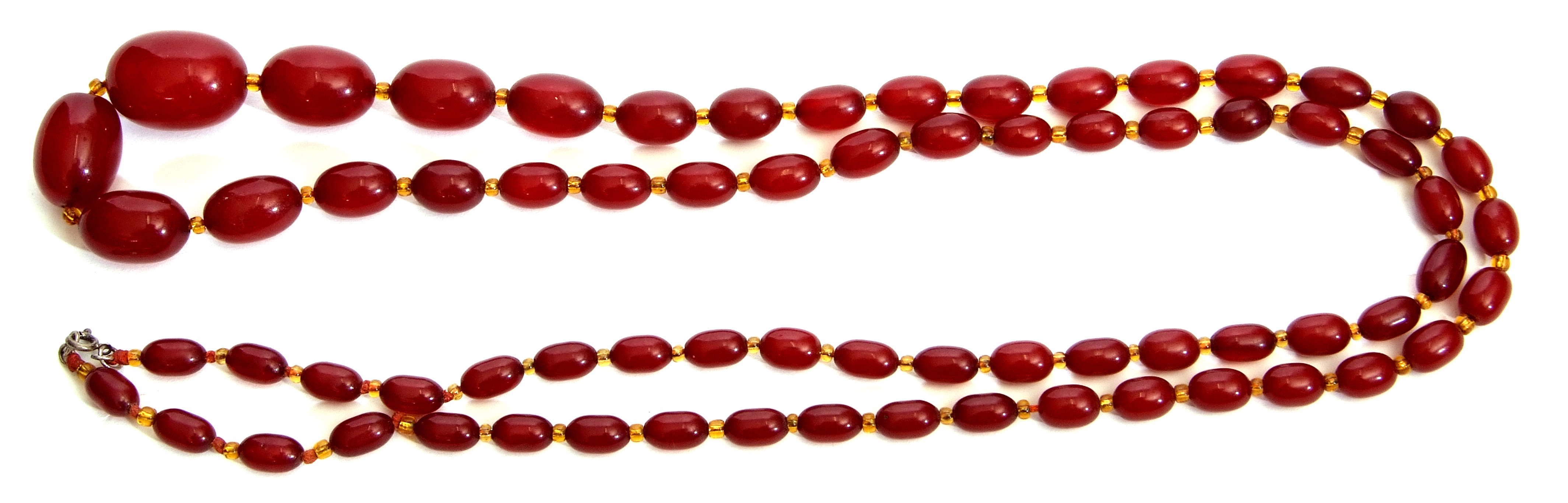 Vintage cherry amber necklace, a long single row of graduated oblong beads, 1cm to 3cm, interspersed - Image 2 of 2