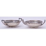 Pair of George V two-handled circular bon-bon dishes of good gauge, the sides pierced with geometric