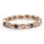 Diamond and sapphire full eternity ring alternate set in a Celtic design with small diamonds and