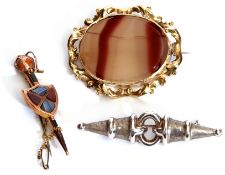 Mixed Lot: 9ct stamped Scottish agate brooch, a sword and shield design, a 925 stylised brooch,
