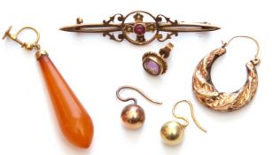 Mixed Lot: shaped leatherette box to include a 9ct stamped amethyst and seed pearl brooch, one amber