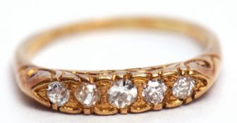 Antique five-stone diamond ring, the carved setting with 5 graduated small diamonds, line set,