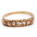 Antique five-stone diamond ring, the carved setting with 5 graduated small diamonds, line set,