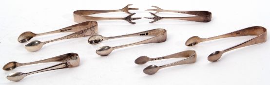 Mixed Lot: five small pairs of sugar tongs in Old English pattern together with two pairs of sugar