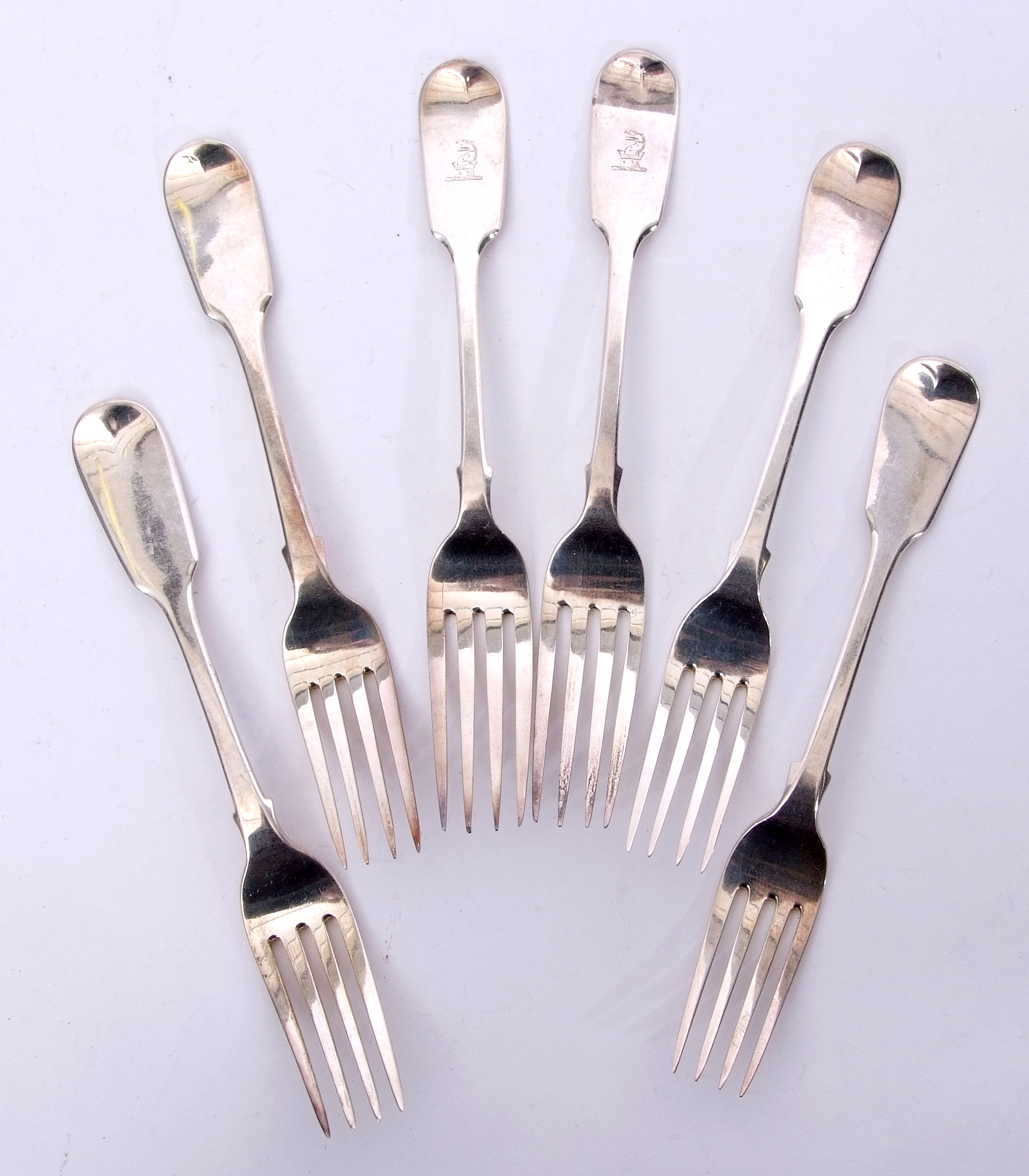 Matched set of six late Georgian/Victorian dessert forks in Fiddle pattern, various makers and