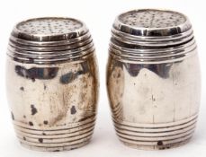 Pair of unmarked white metal pepperettes formed as coopered barrels, 5cm tall (2)