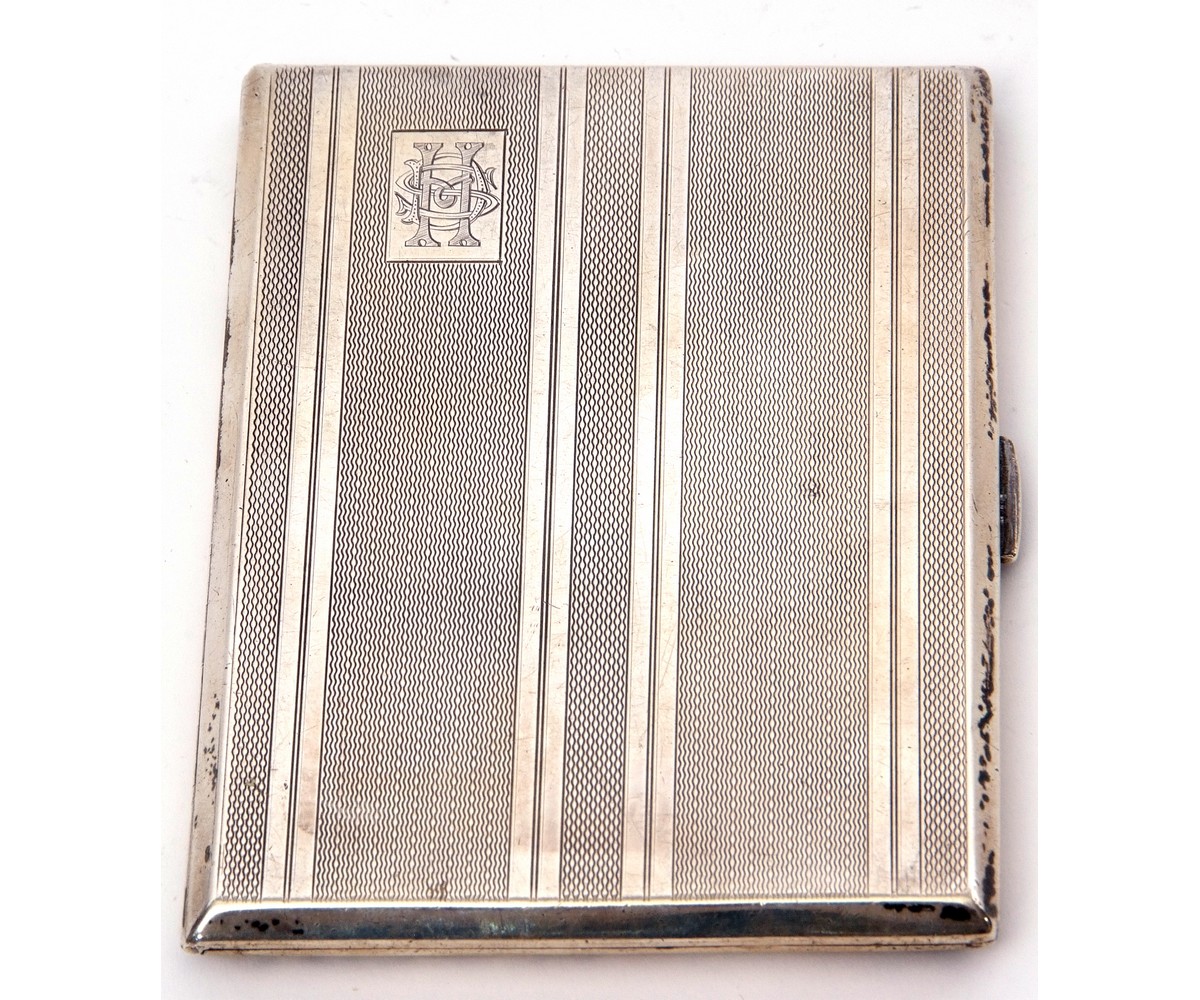 George VI cigarette case of rectangular shape with chamfered edges, banded engine turned decoration,
