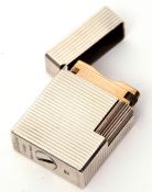 Mid/late 20th century Dupont silver plated cigarette lighter of rectangular form with chamfered