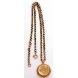 Antique 9ct stamped belcher link and chain, suspending a circular back and front engraved locket,