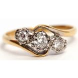 Edwardian 18ct gold and diamond three-stone ring featuring 3 small single cut diamonds, each in star