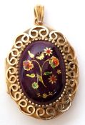 9ct gold and enamel locket, the oval puce coloured enamel cabochon decorated with flowers and