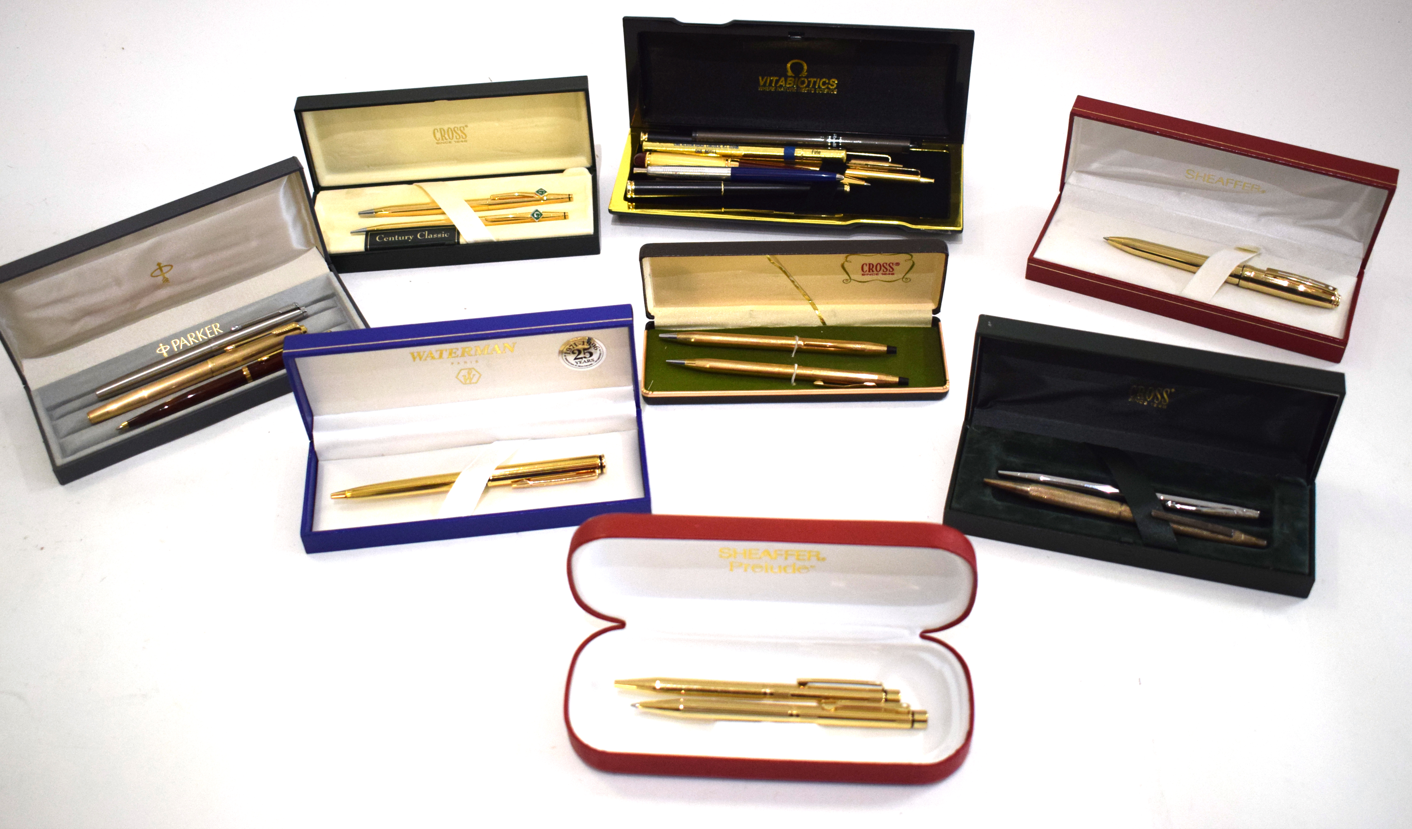 Mixed Lot: cased Sheaffer gold plated pencil and ballpoint pen set, a cased Sheaffer gold plated