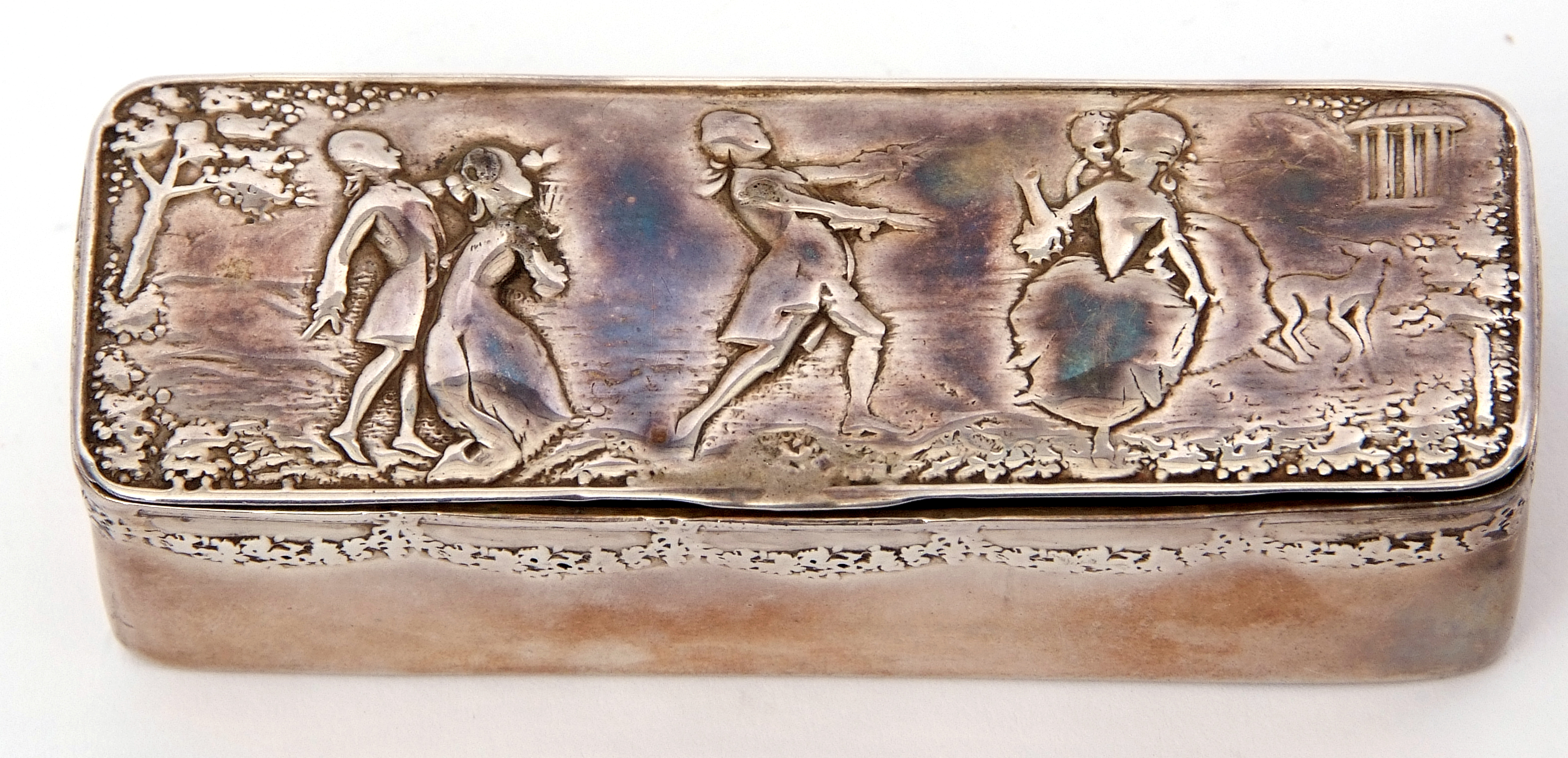 Edwardian period import hallmarked silver encased ring box, the lid embossed with romantic