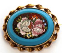 Vintage micro-mosaic brooch, floral design, in a blue hardstone surround within an ornate yellow