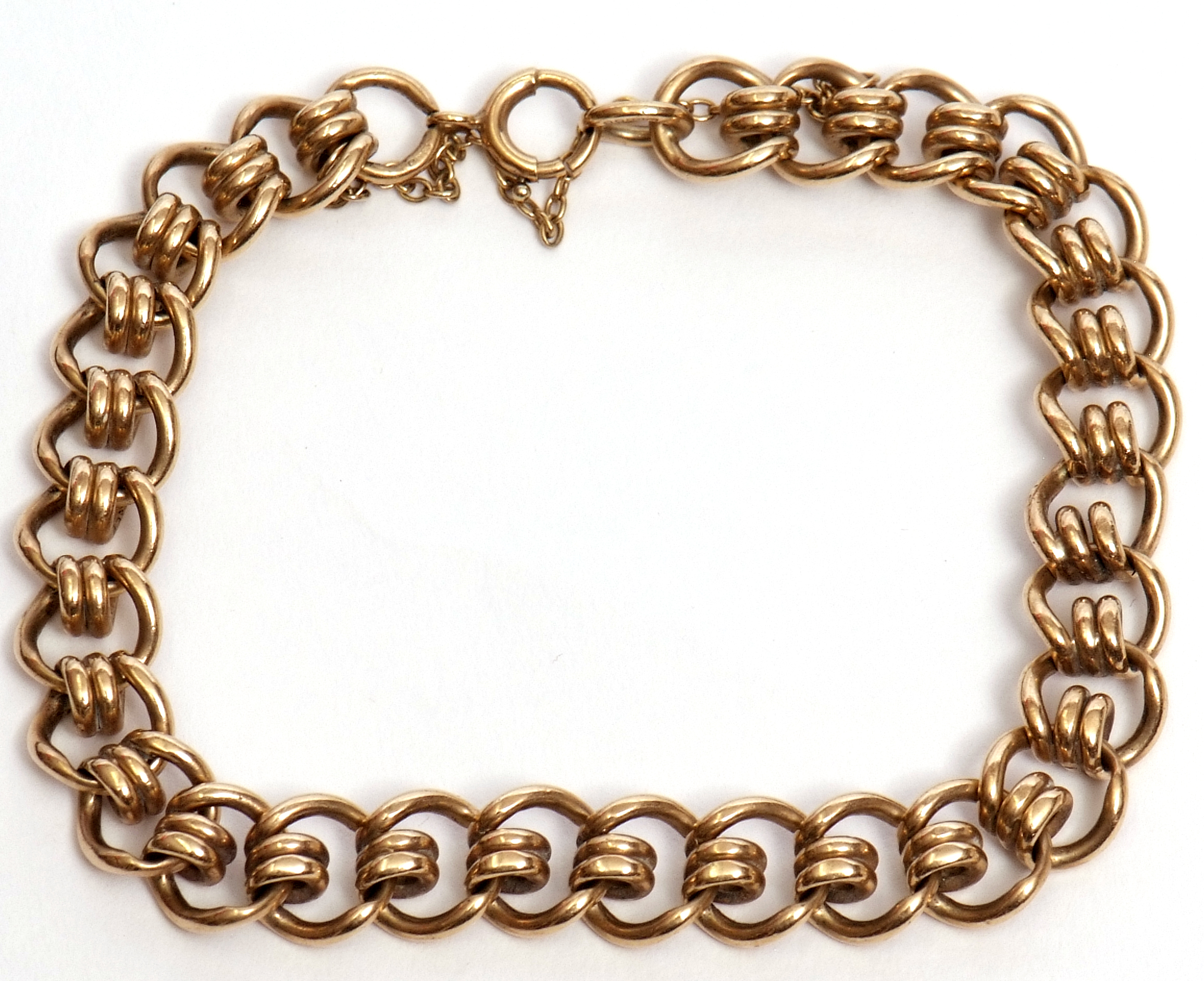 9ct gold curb and coil link bracelet, safety chain fitting, hallmarked Birmingham 1982, 27.8gms - Image 2 of 2