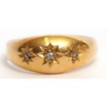 Edwardian 18ct gold and diamond three stone ring featuring three small single cut diamonds, each