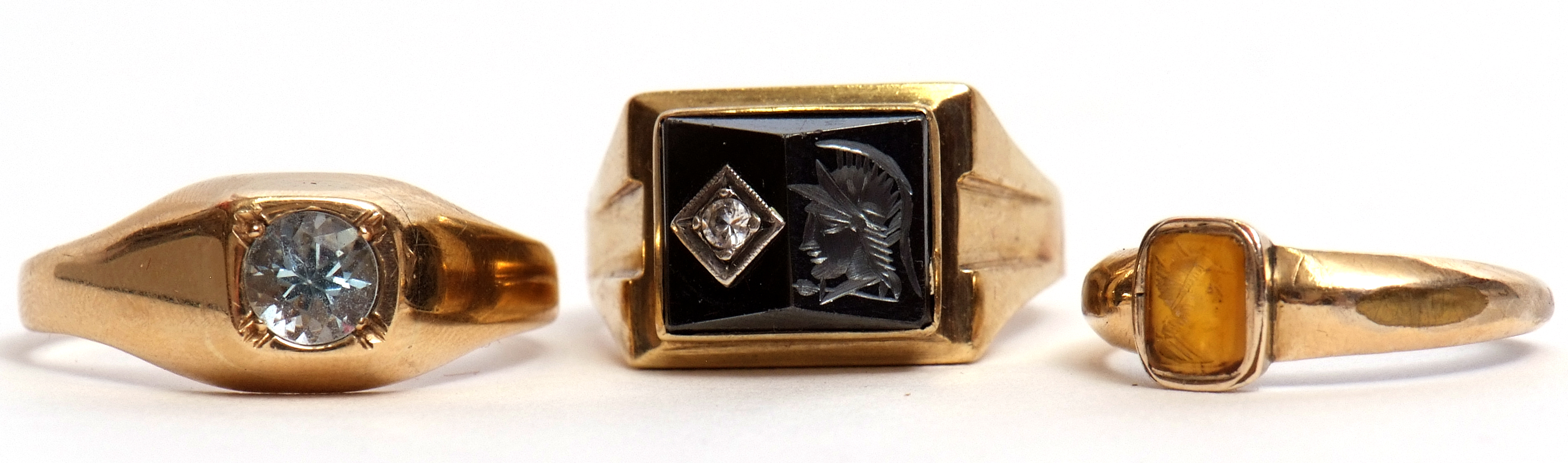 Mixed Lot: gent's dress ring set with a carved haematite panel and highlighted with a white stone,