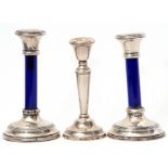 Pair of George V silver mounted and blue glass stemmed dressing table candlesticks on reeded and