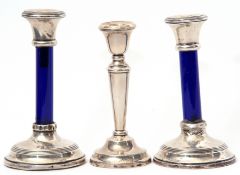 Pair of George V silver mounted and blue glass stemmed dressing table candlesticks on reeded and