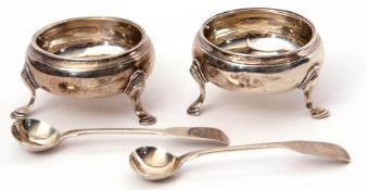 Pair of early George III circular silver three-footed salts of plain design, London 1767 by