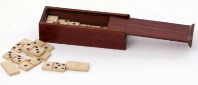 19th/20th century mahogany cased set of miniature bone dominoes, the case measuring 6cm x 2cm x 1.