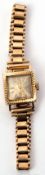 Ladies vintage Tudor Royale 9ct gold wrist watch, gold hands and bars to a discoloured silvered dial